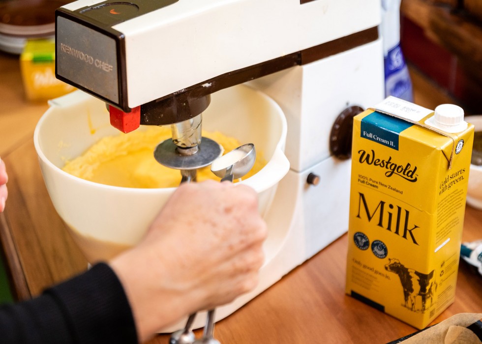 cake mixer with carton of UHT Milk on counter